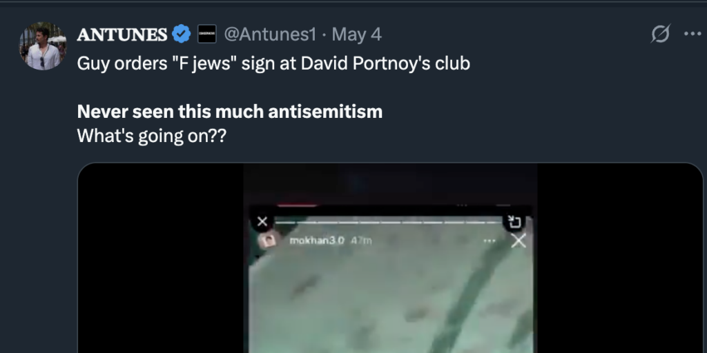 Screenshot of a tweet by @Antunes1 stating “Guy orders 'F jews' sign at David Portnoy's club,” with the caption “Never seen this much antisemitism. What’s going on??” and a blurred video frame underneath.